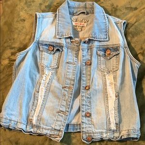 Worn jean vest